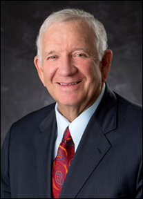 Dr. Robert B. Sloan, President of bվ